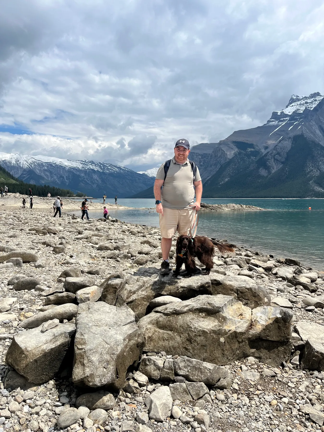 Tilly and me on the rocky shore at Lake Minnewanka