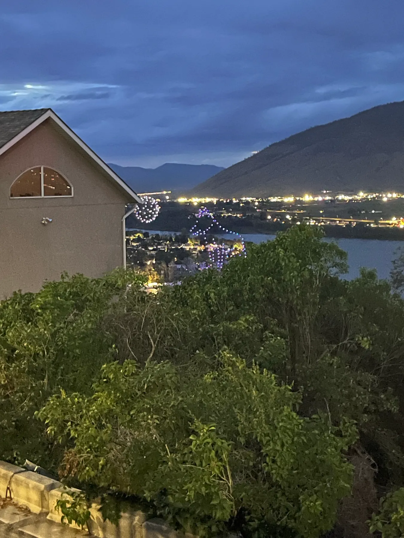 Kamloops and the river lit after dark on Canada Day