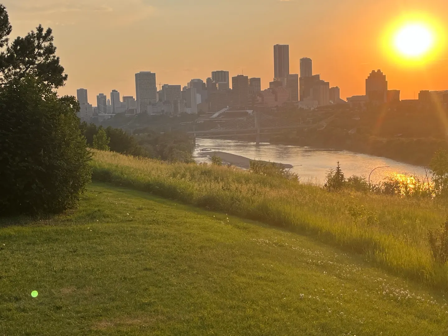 Sunset over the Edmonton skyline from Strathearn Park