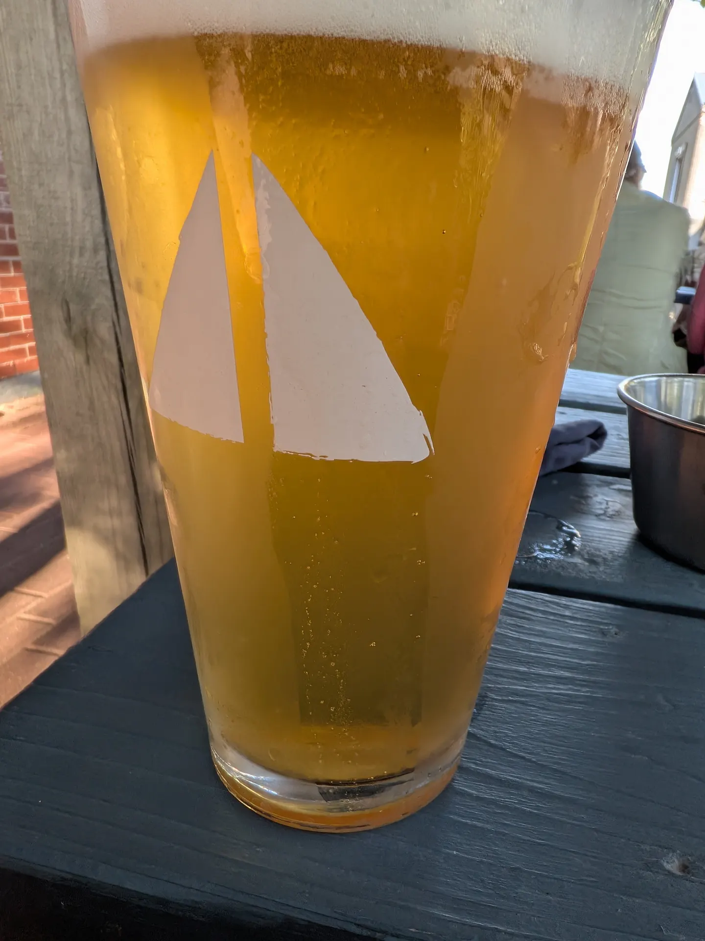 A pint of beer on the Evermore patio table in Summerside