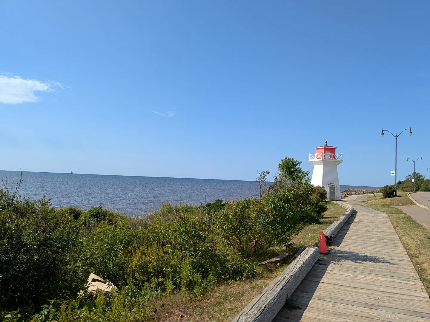 The Summerside Baywalk Boardwalk leading toward its small lighthouse