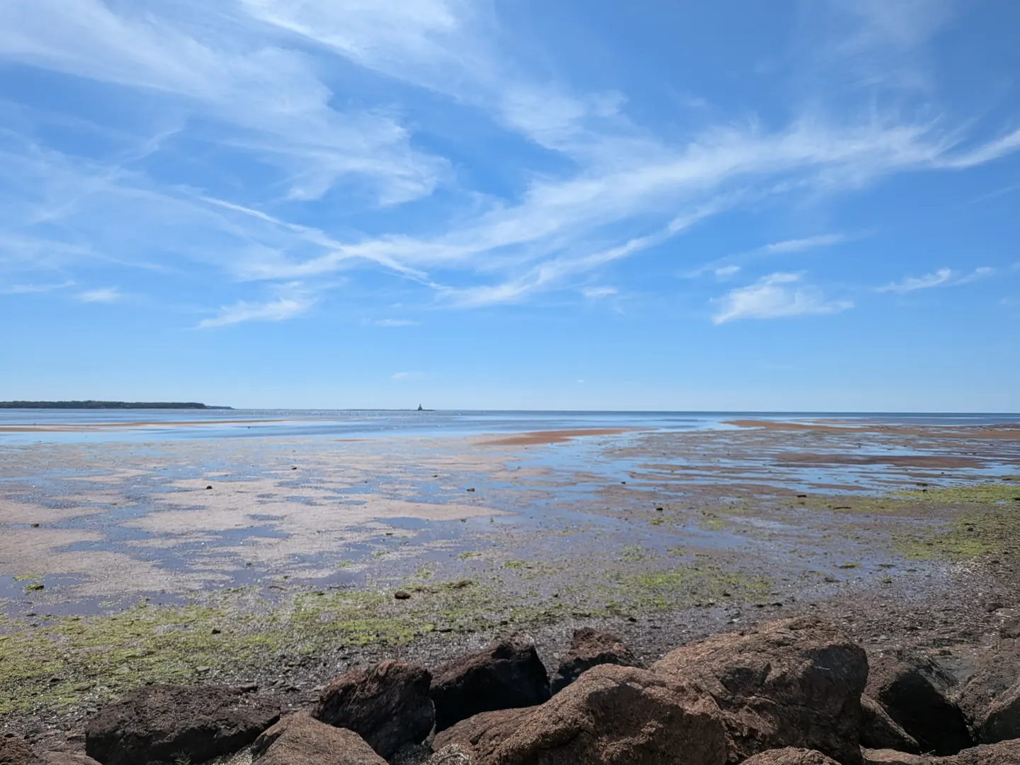 The tidal shoreline and open water from Summerside Baywalk
